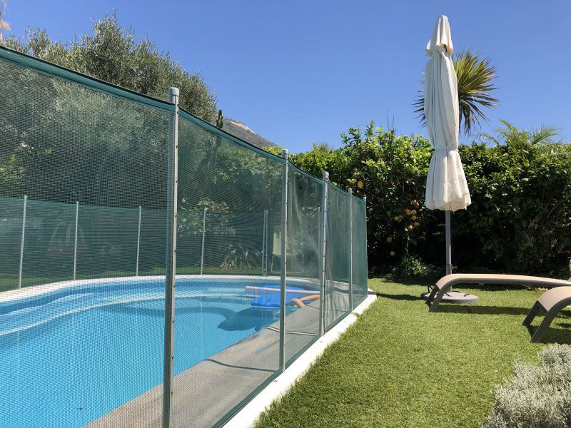Removable Mesh Fence by the Pool